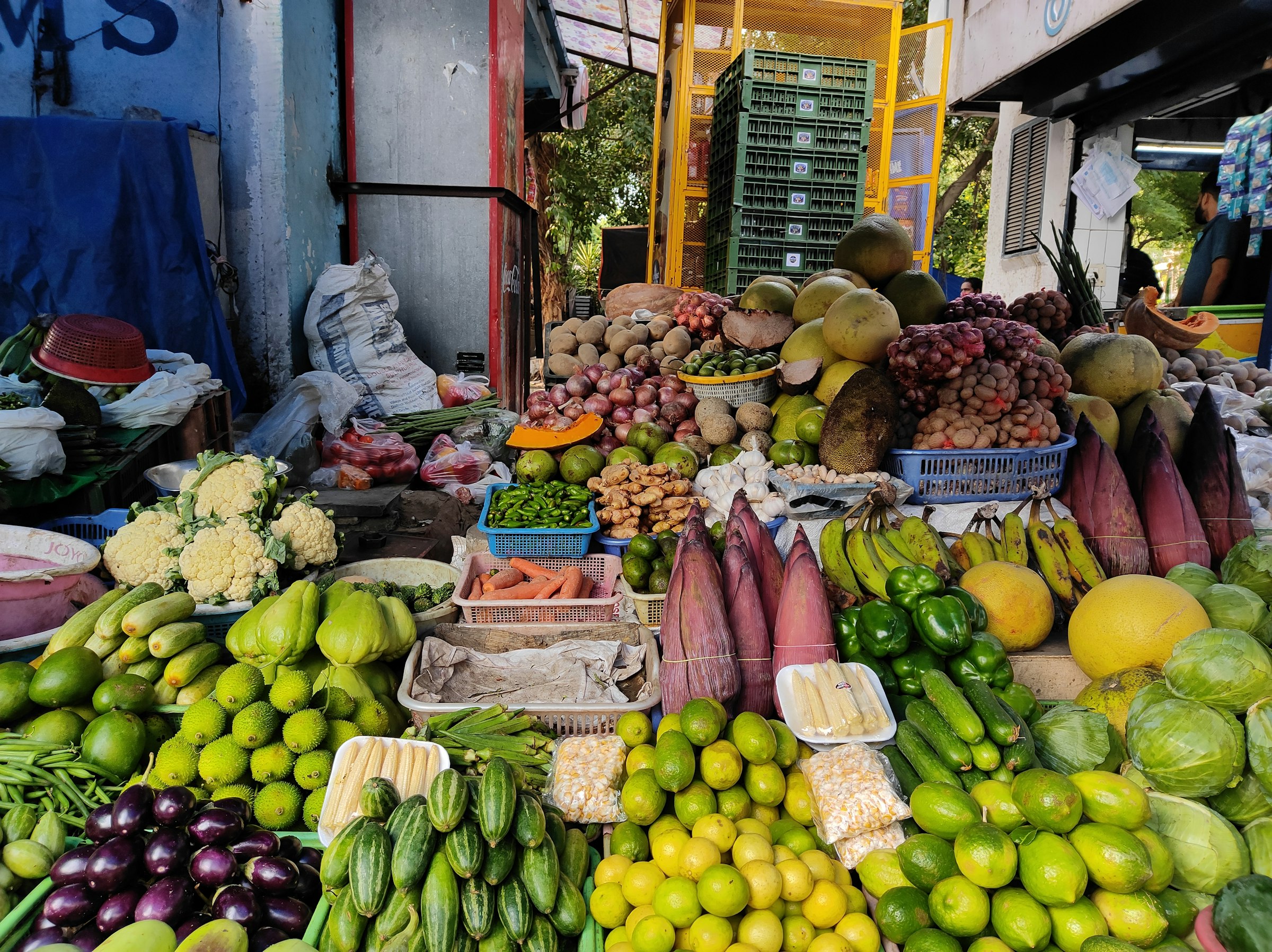 A vegetable stall piled with fresh produce