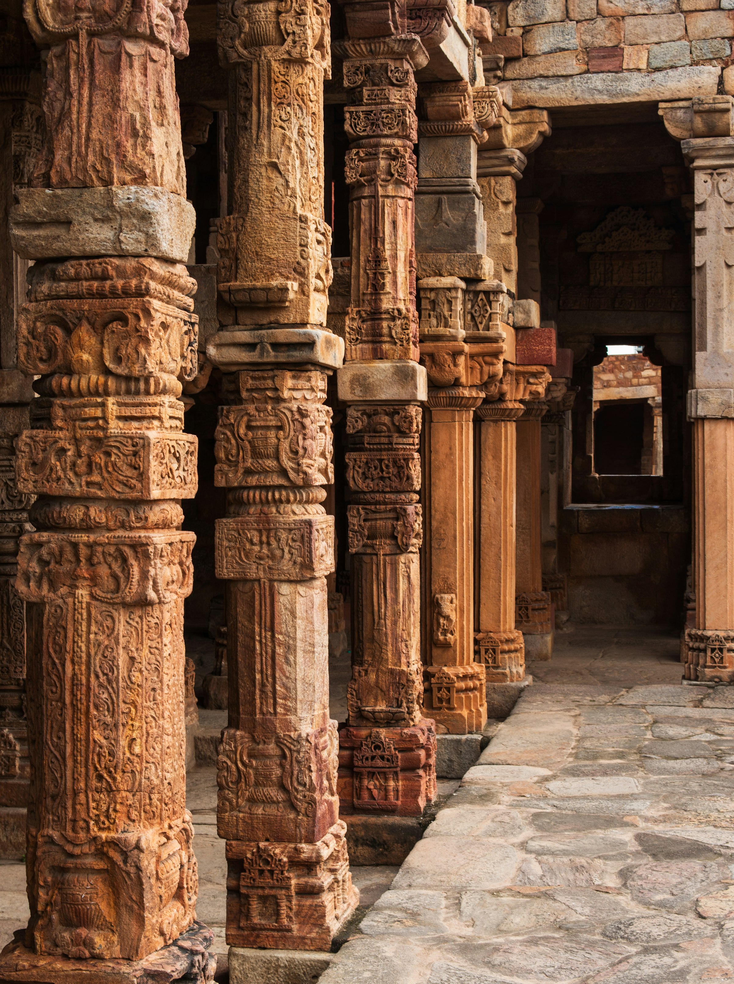 Carved stone pillars in the Qutub complex