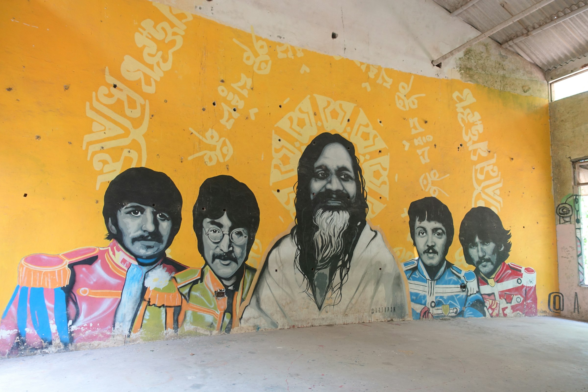 A mural of the Beatles and Maharishi Mahesh Yogi
