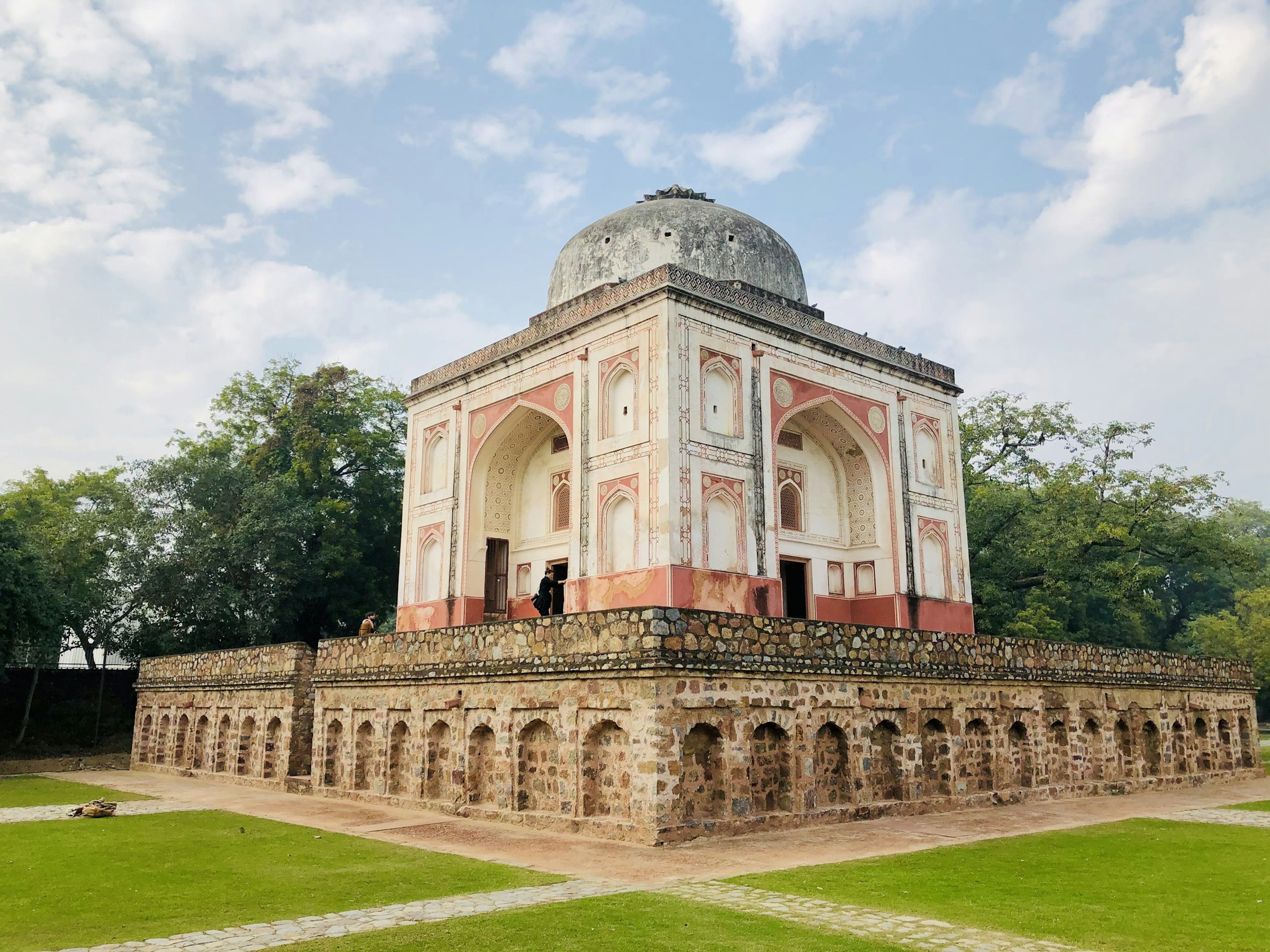 A monument beside a lawn in Sunder Nursery